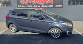 Kia Carens , garage STARKAR  ORANGE