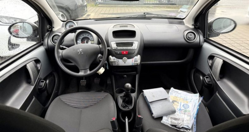 Peugeot 107 1.0 70ch Blue lion Navteq 5p 2013 - photo n°7 Peugeot 107 1.0 70ch Blue lion Navteq 5p  occasion à NOUVOITOU - photo n°7