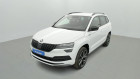 Skoda Karoq occasion Blanc année 2020 boite Robotisee Annonce Skoda Karoq occasion Electrique 1.5 TSI 150ch Sportline DSG7 + Coffre électrique + Pack Hive à SAINT-GREGOIRE