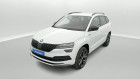 Skoda Karoq occasion Blanc année 2020 boite Robotisee Annonce Skoda Karoq occasion Electrique 1.5 TSI 150ch Sportline DSG7 + Coffre électrique + Pack Hive à SAINT-GREGOIRE
