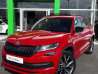 Skoda Kodiaq occasion Rouge année 2020 boite Robotisee Annonce Skoda Kodiaq occasion Diesel 2.0 TDI 150 SCR Sportline DSG 7 places à LESCAR