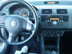 Suzuki Swift 1.3 VVT GLX 4x4 5p Gris occasion  Portet-sur-Garonne - photo n6