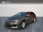 Toyota Auris Touring Sports occasion Gris année 2016 boite Variation continue Annonce Toyota Auris Touring Sports occasion Hybride HSD 136h Dynamic Business à Pluneret