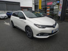 Toyota Auris Touring Sports occasion Blanc année 2018 boite Automatique Annonce Toyota Auris Touring Sports occasion Hybride TOURING SPORTS RC18 Hybride 136h à VANNES