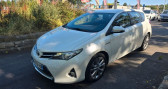 Toyota Auris occasion année 2014 boite Automatique Annonce Toyota Auris occasion Hybride 1.8l 136h Hybride dynamic GARANTIE à SANNOIS