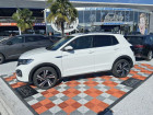 Volkswagen T-cross occasion Blanc année 2021 boite Automatique Annonce Volkswagen T-cross occasion Essence 1.5 TSI 150 DSG7 R-LINE JA 18 GPS Caméra ADML à Cahors